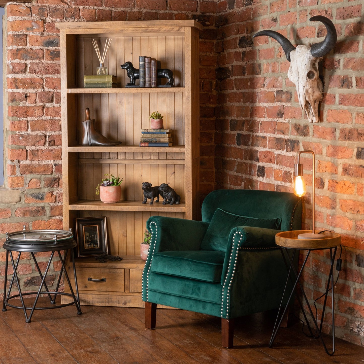 Copper industrial lamp with a stone base, featuring a sleek design that complements modern decor, highlighted in a cozy setup.