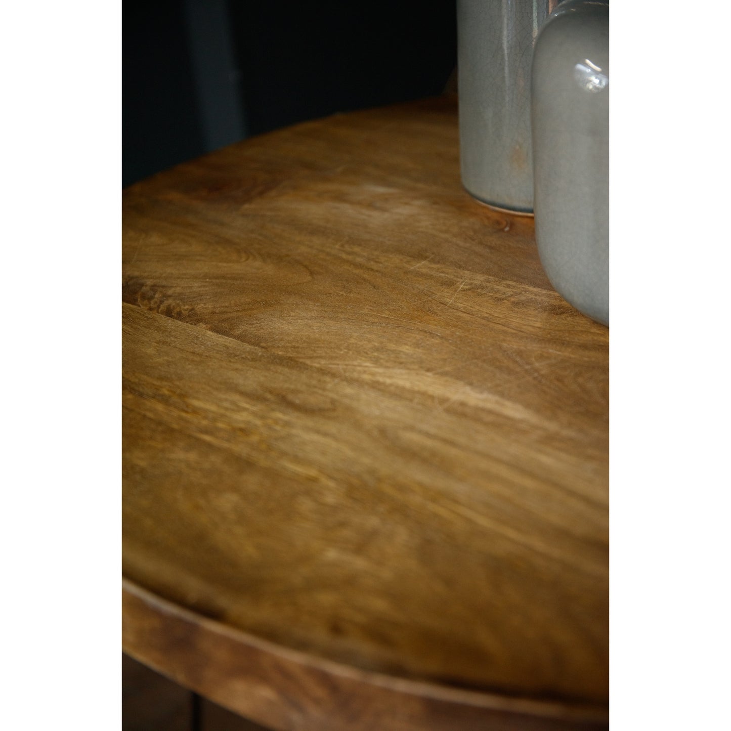 Hardwood bar table top showcasing rich, warm wood grain, paired with sleek metal elements for a modern, industrial look.