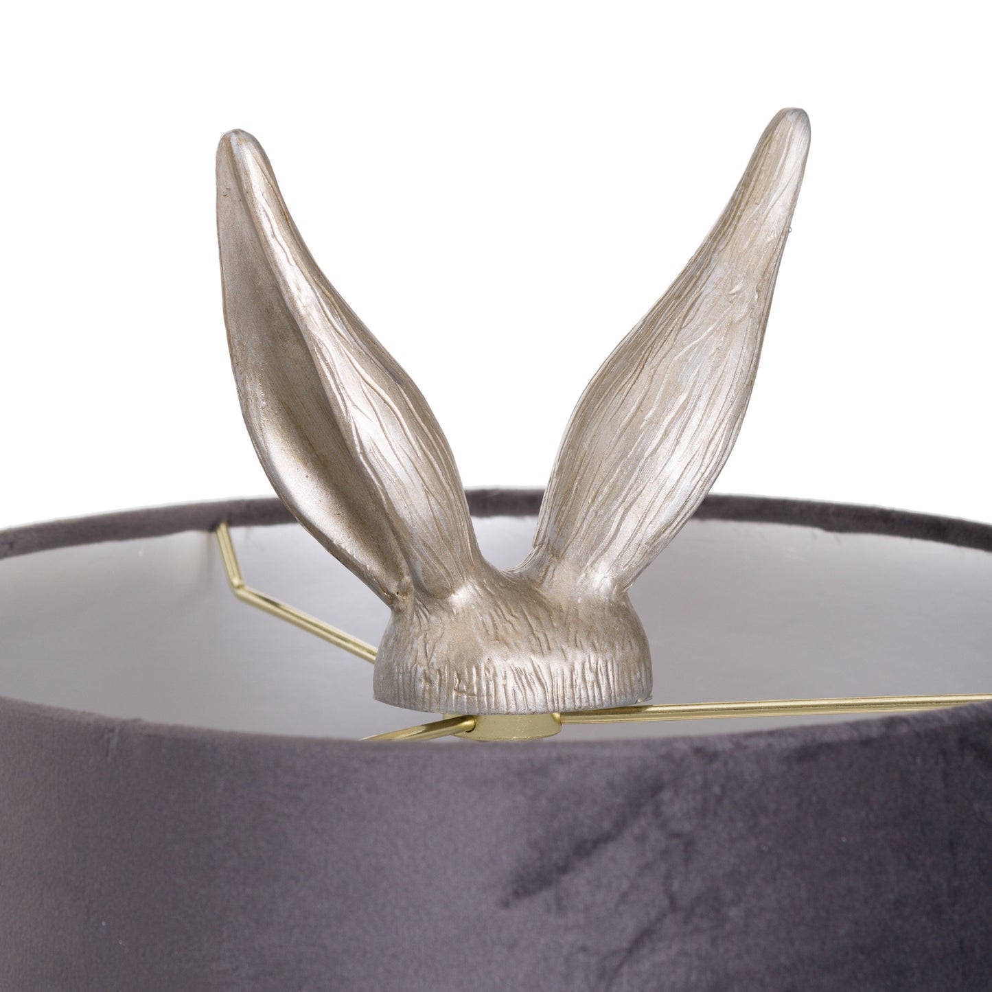 Silver hare table lamp with elegant grey velvet shade; whimsical design adds charm and warmth to any space.