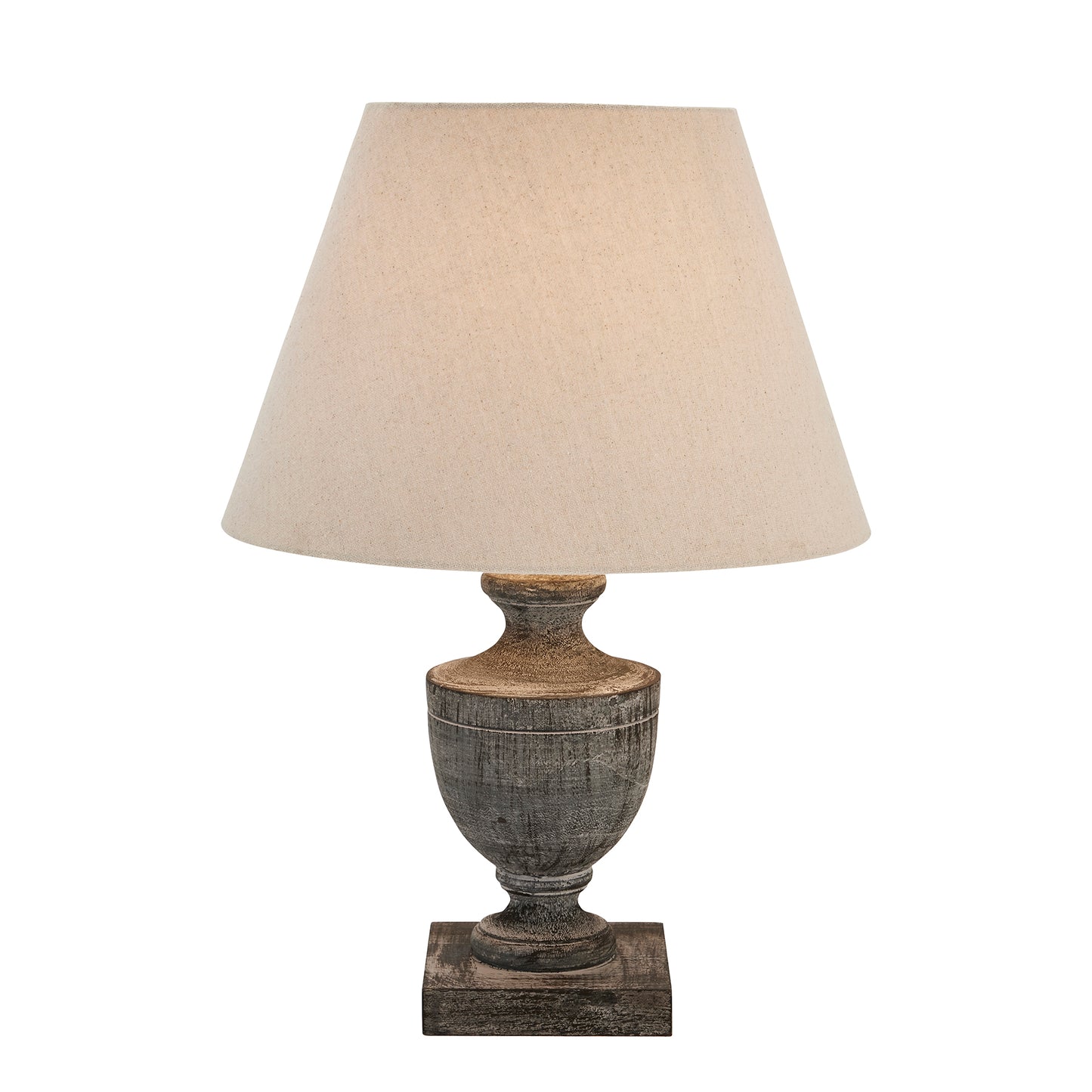 Wooden table lamp with a grey-washed urn base and a soft beige linen shade, exuding warmth and understated elegance.