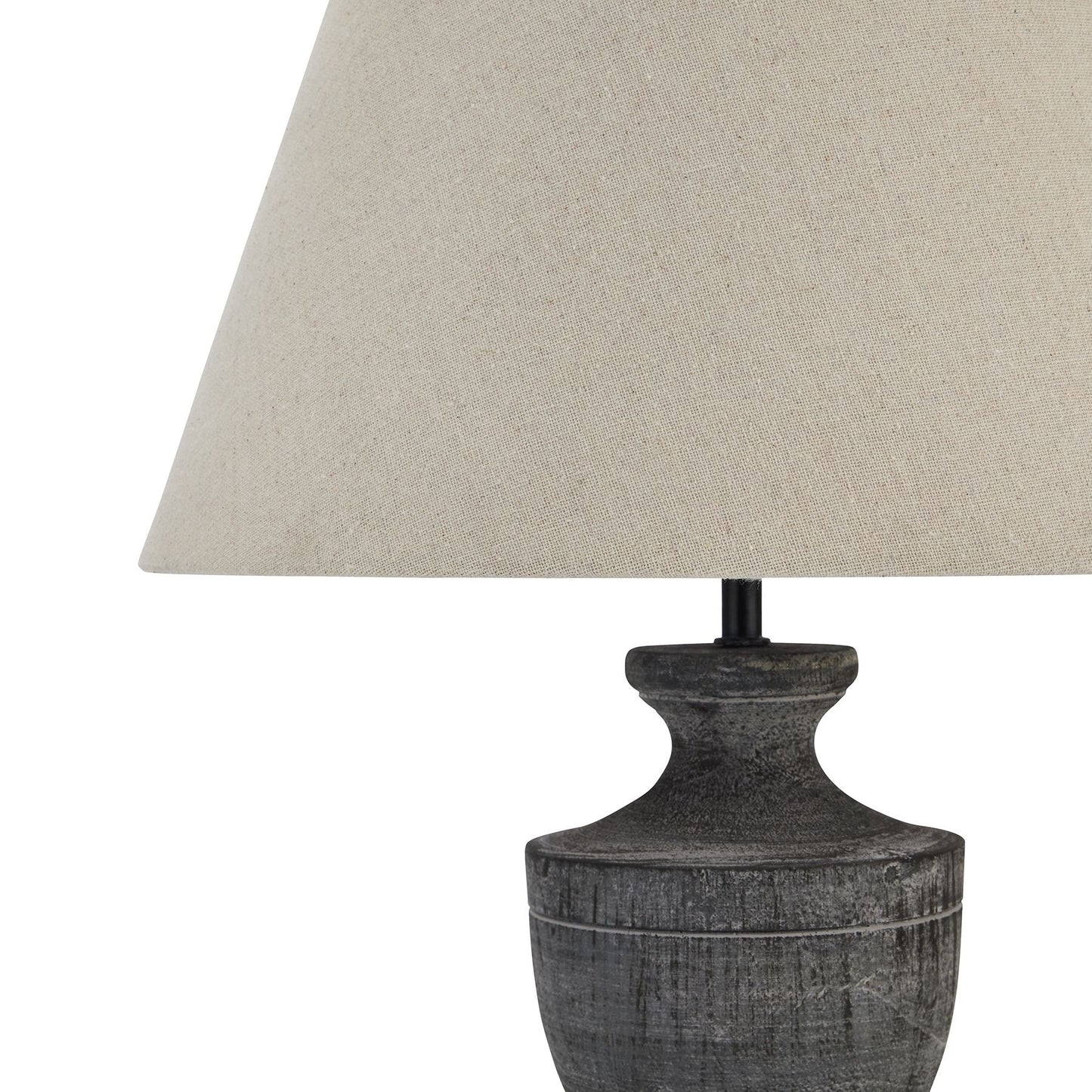 Grey-washed wood base table lamp with a neutral linen shade, offering a warm, inviting glow and elegant design.