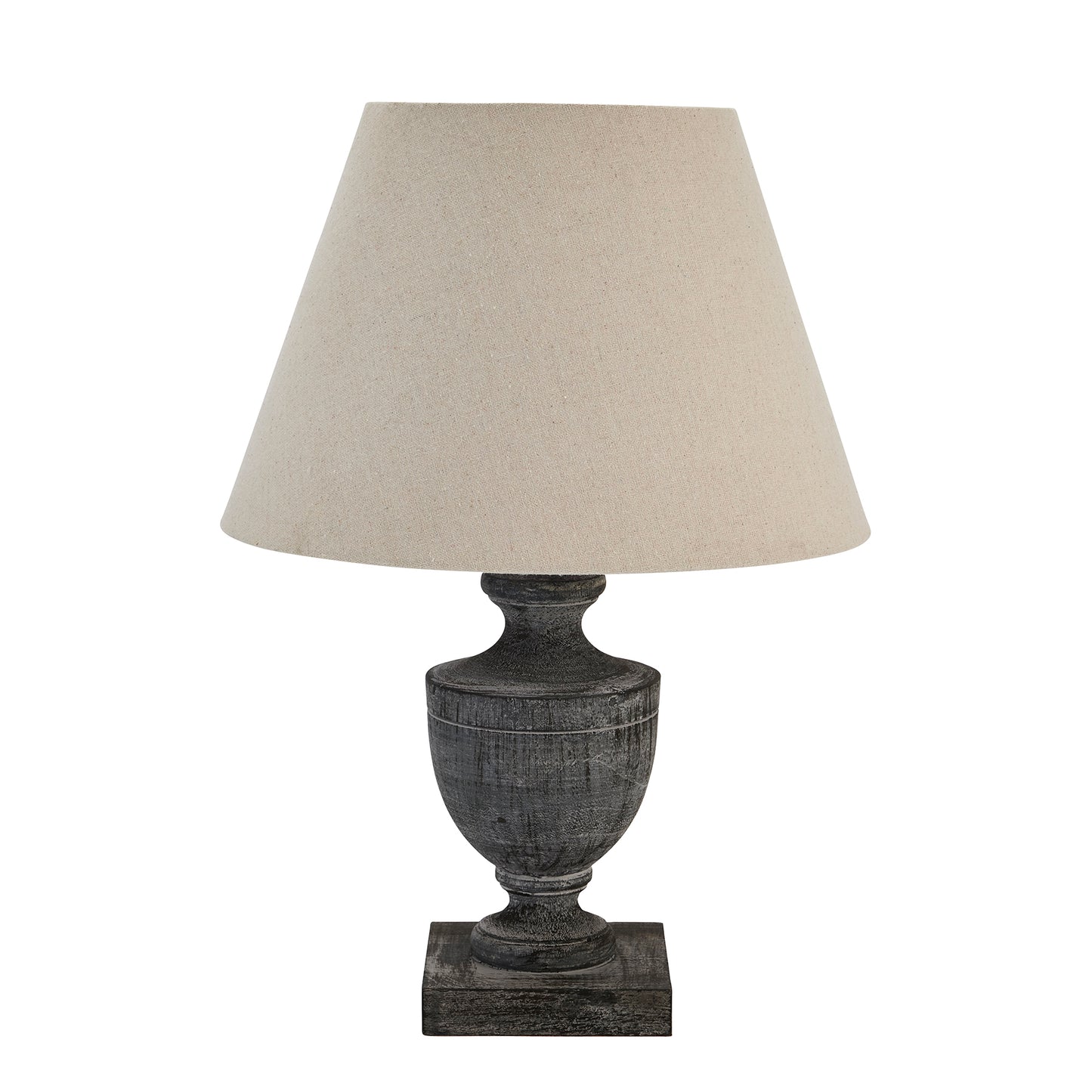 Grey-washed wooden table lamp with an elegant urn shape and a soft linen shade, creating a warm, inviting glow.