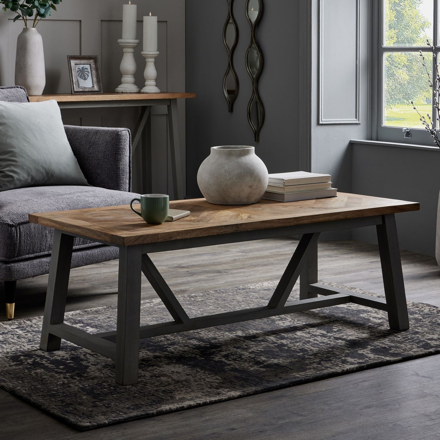 Stylish Darcy Stone Planter in neutral stone color, blending traditional and modern design, perfect for showcasing decor.