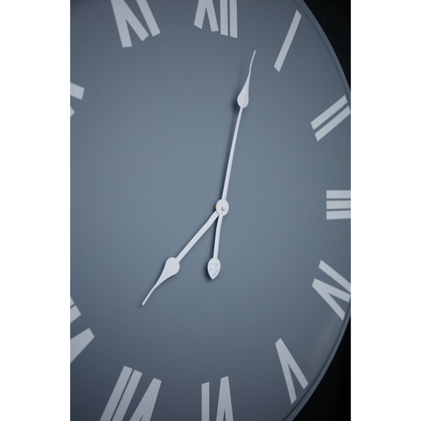Large wall clock featuring a sleek light grey face with bold white Roman numerals and hands, measuring 80cm in diameter.