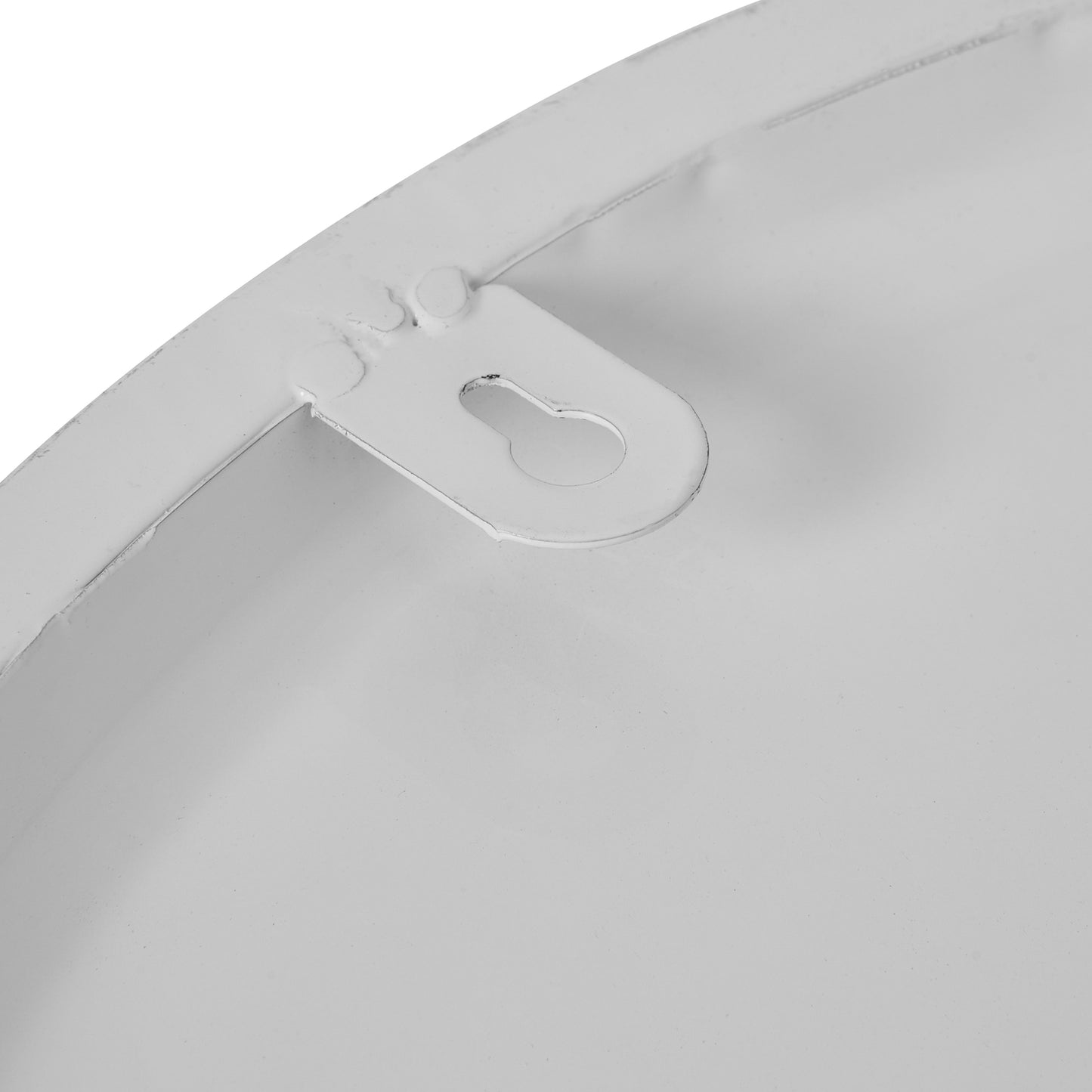 Sleek white wall clock featuring a bold circular shape and metalwork, ideal for modern, minimalist decor.