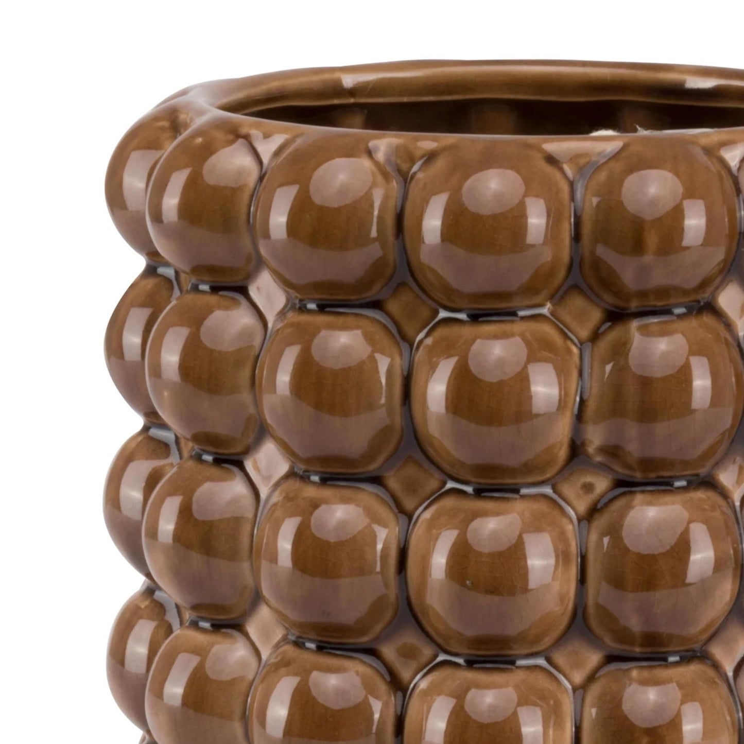 Handcrafted ceramic planter in rich caramel glaze, featuring a unique bubble texture that adds depth and sophistication.