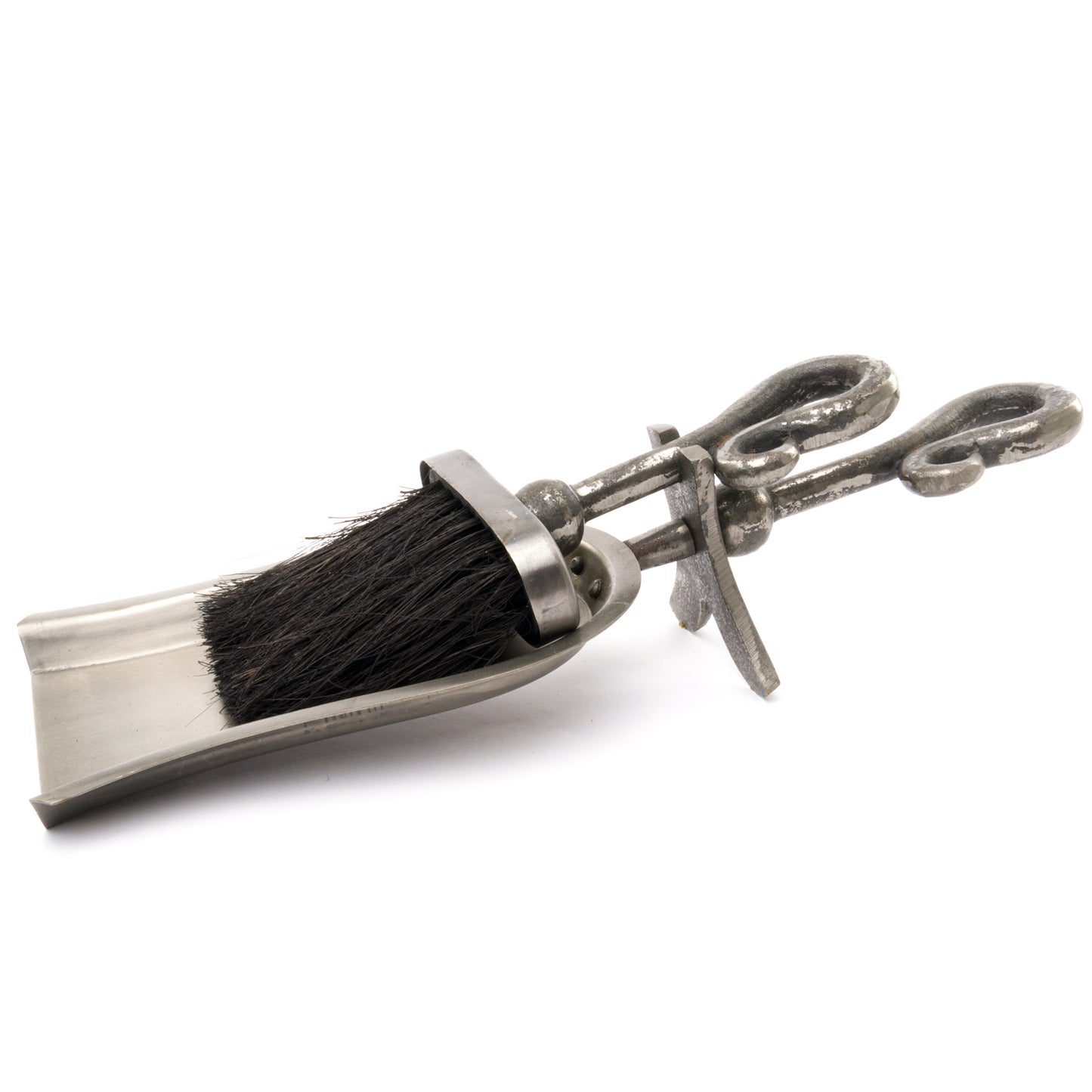 Antique pewter hearth tidy with a curved handle and brush, featuring a metallic finish and elegant design, perfect for any fireplace.