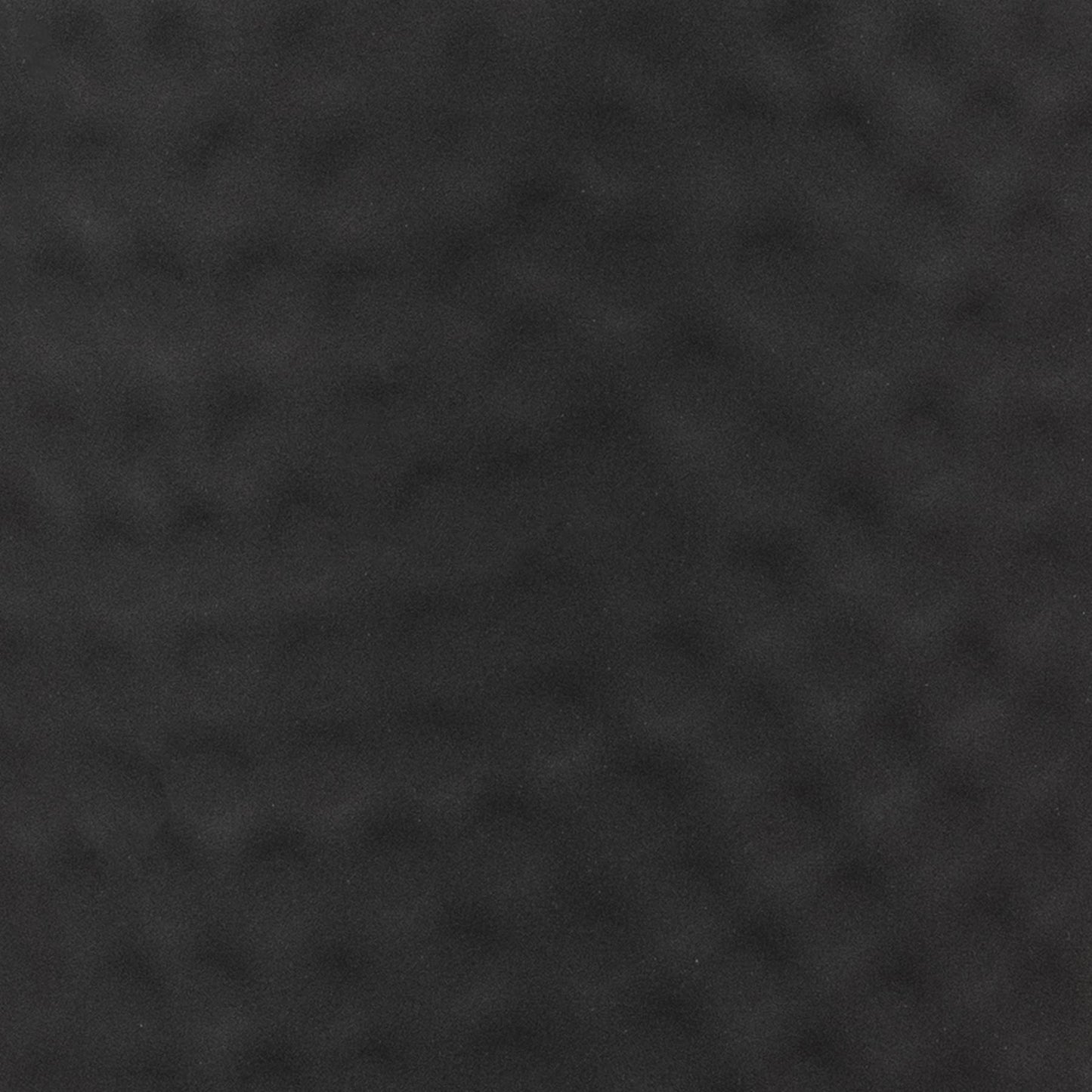 Matt black hammered vase with lid, featuring a distinctive textured surface that creates captivating light reflections.
