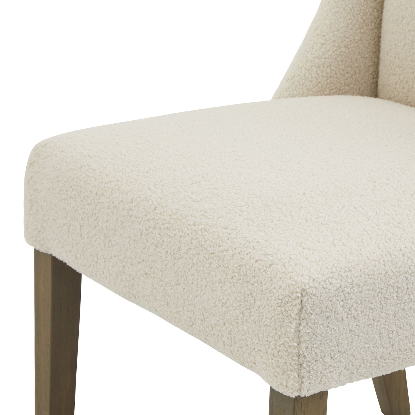 Cream boucle upholstery dining chair with a sleek rubberwood frame, combining elegance and modern design. Ideal for stylish dining spaces.