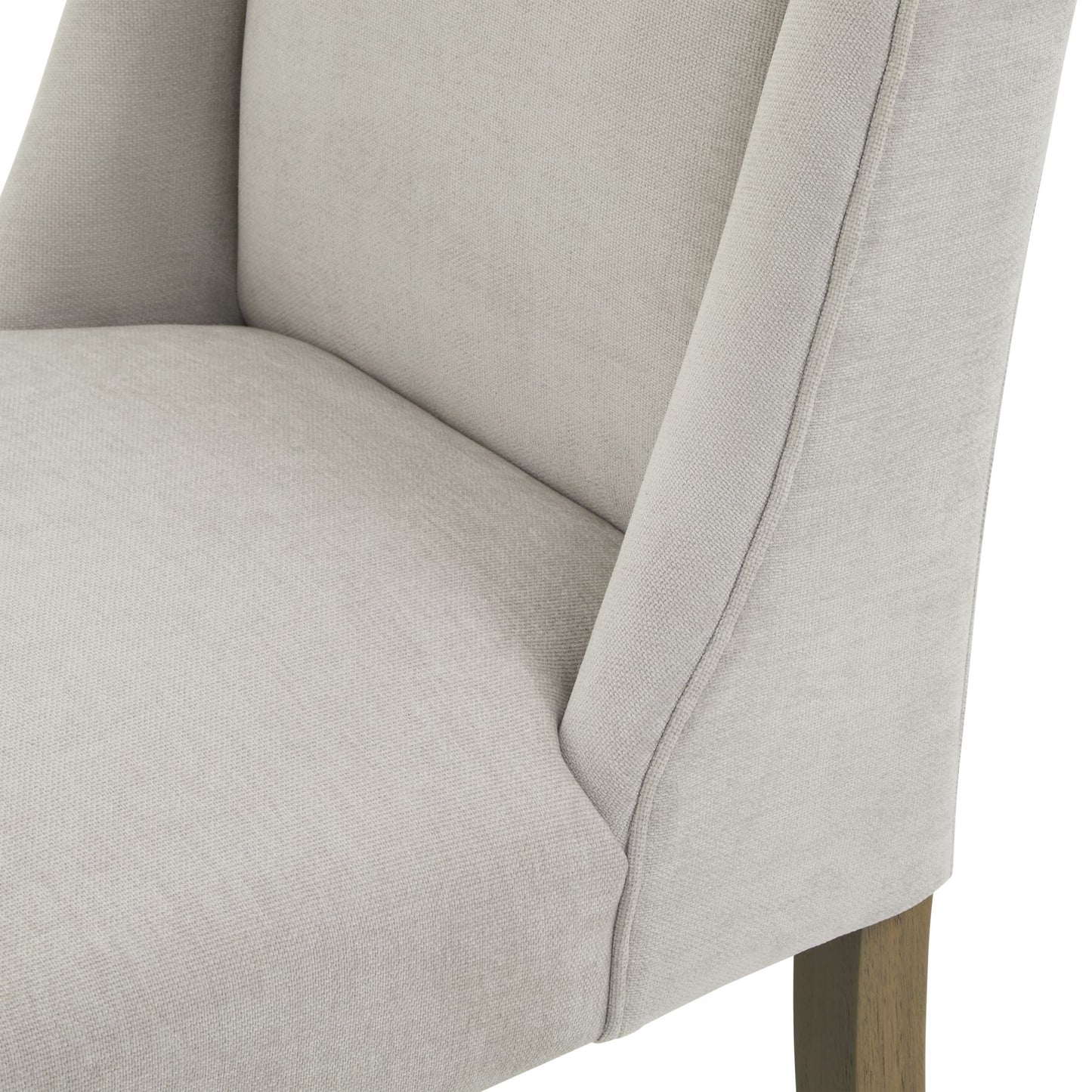 Light grey upholstered dining chair with a rubberwood frame, showcasing a blend of traditional and contemporary design.