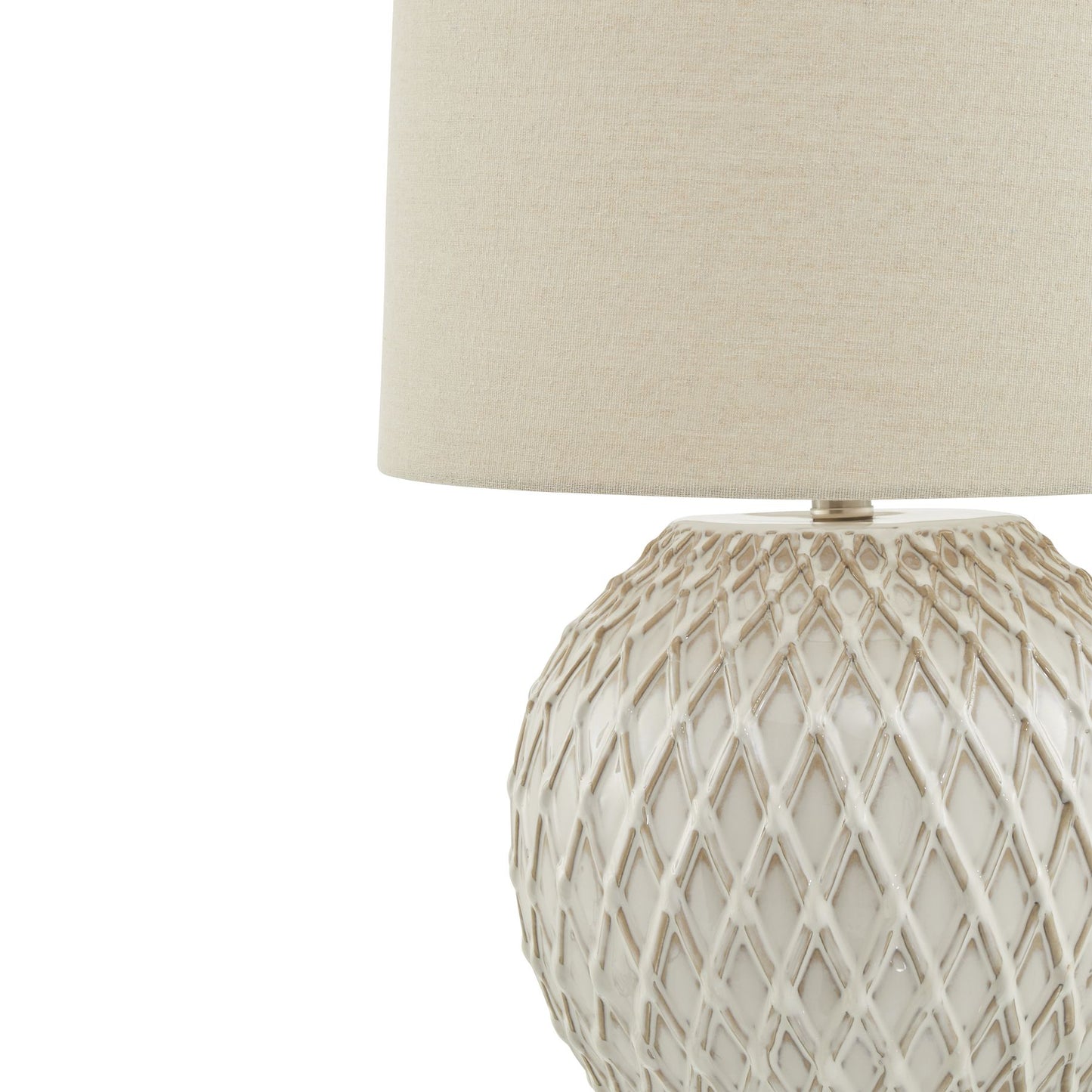 Lattice ceramic table lamp in white with a natural linen shade, showcasing intricate design for elegant, warm lighting.