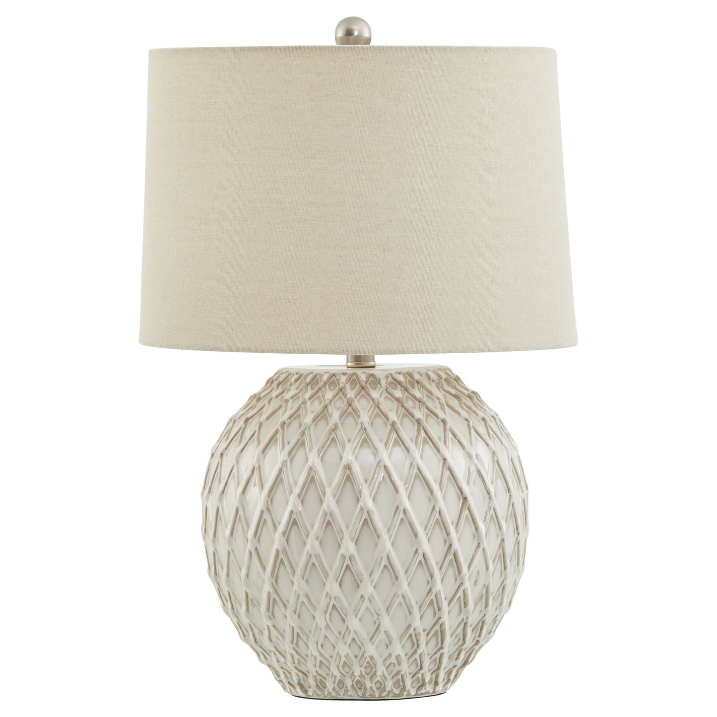 Lattice ceramic table lamp with a white, intricately designed base and a natural linen shade, emitting warm ambient light.
