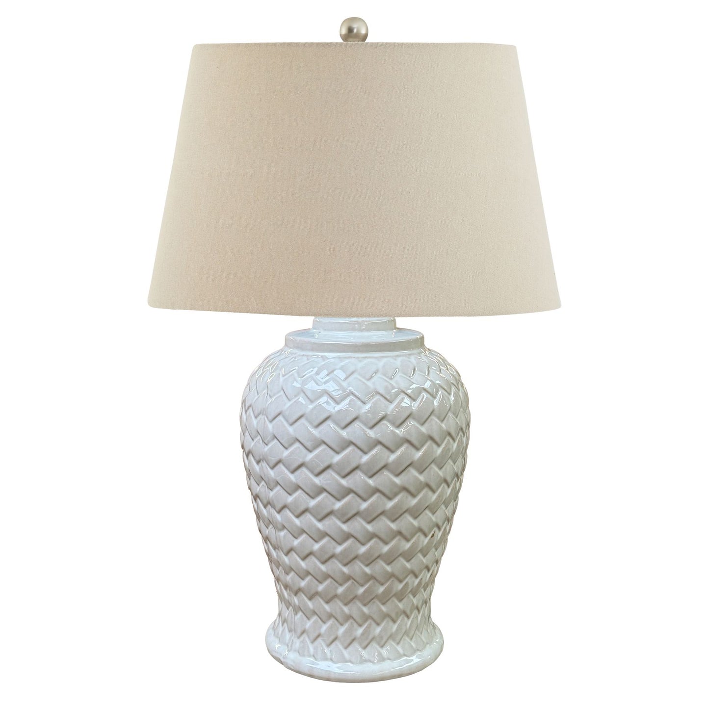 Woven ceramic table lamp with a textured chevron pattern, topped with a soft white linen shade, exuding elegance.