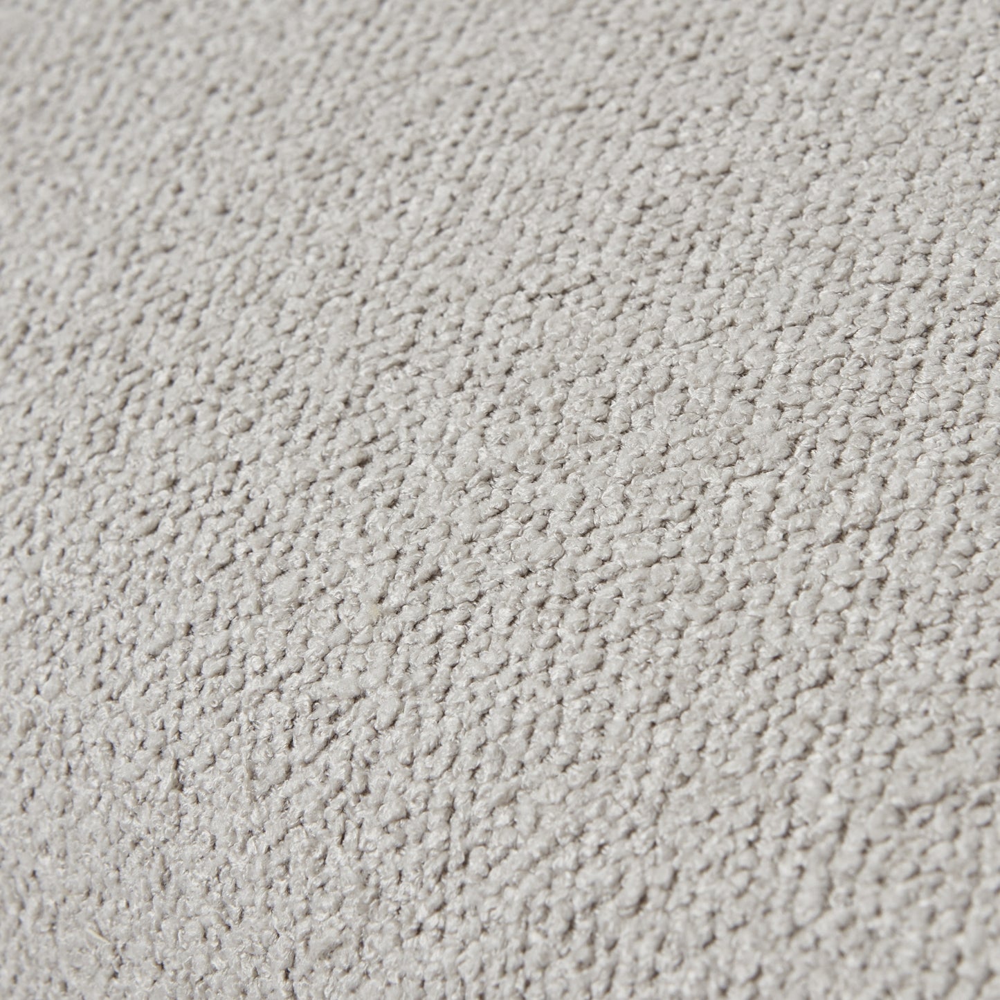 Plush, neutral-toned twill upholstery with a textured surface, perfect for elegant dining environments.