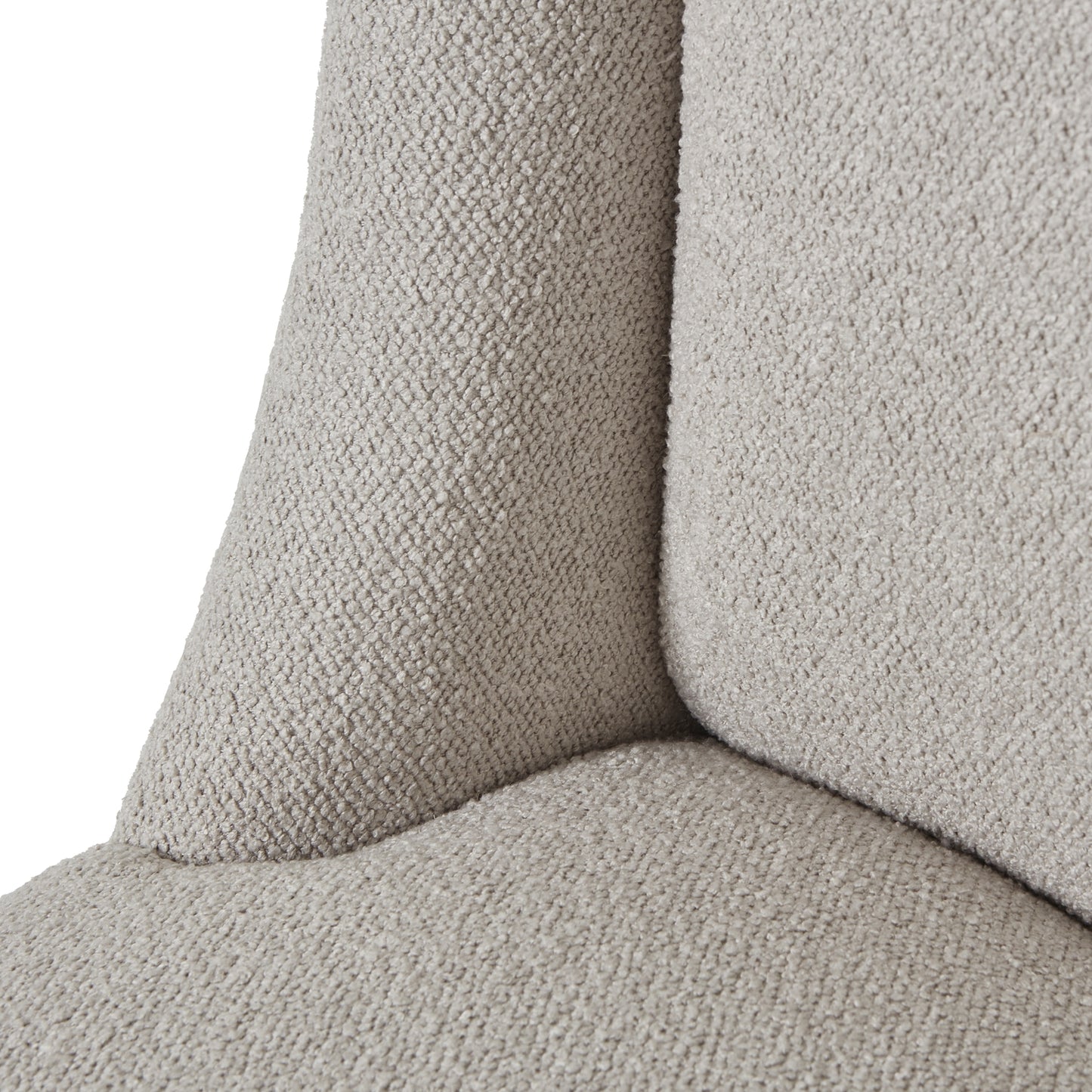 Neutral-toned twill upholstery with a textured finish, featuring a curved backrest and plush seat for elegant comfort.