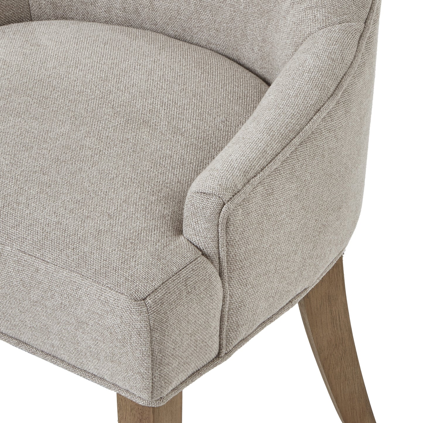 Plush oatmeal twill dining chair with tufted detailing and sturdy oak legs, offering elegant comfort for any dining space.