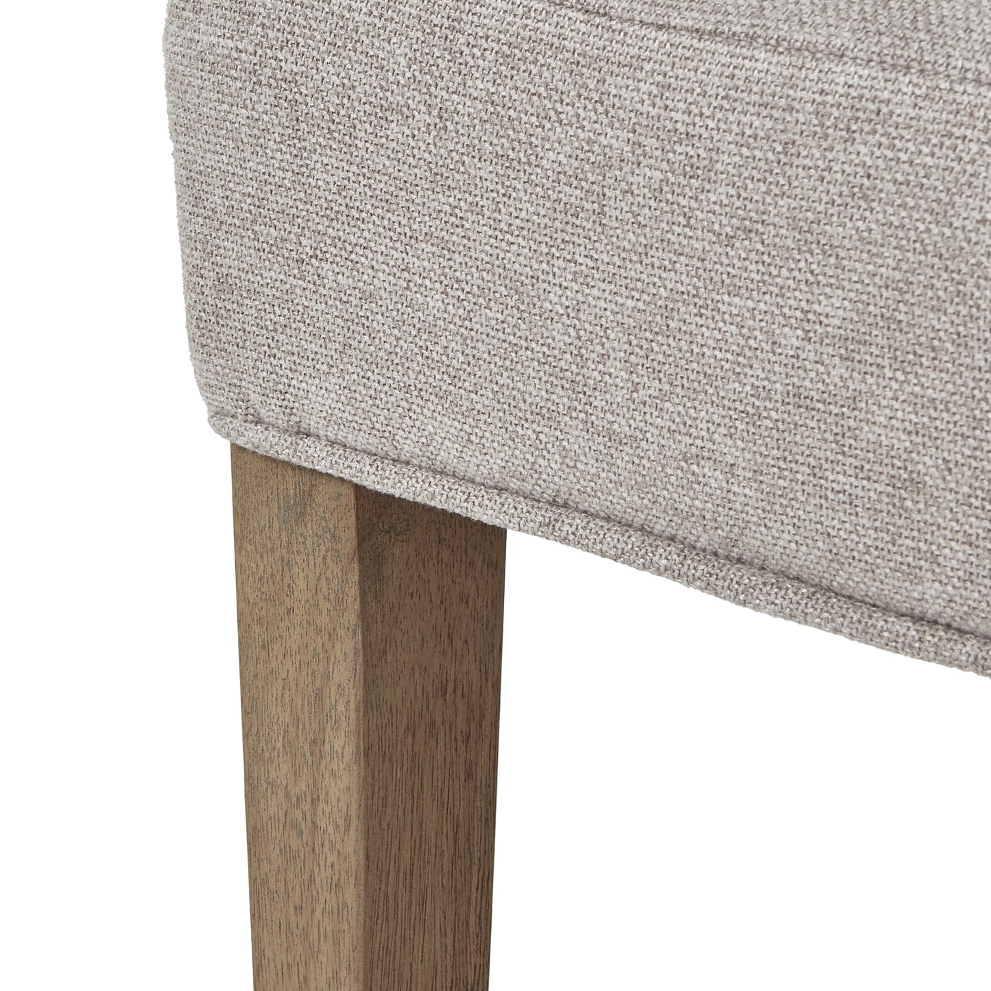 Plush oatmeal twill dining chair with tufted design and solid oak legs, exuding elegance and comfort for any dining space.