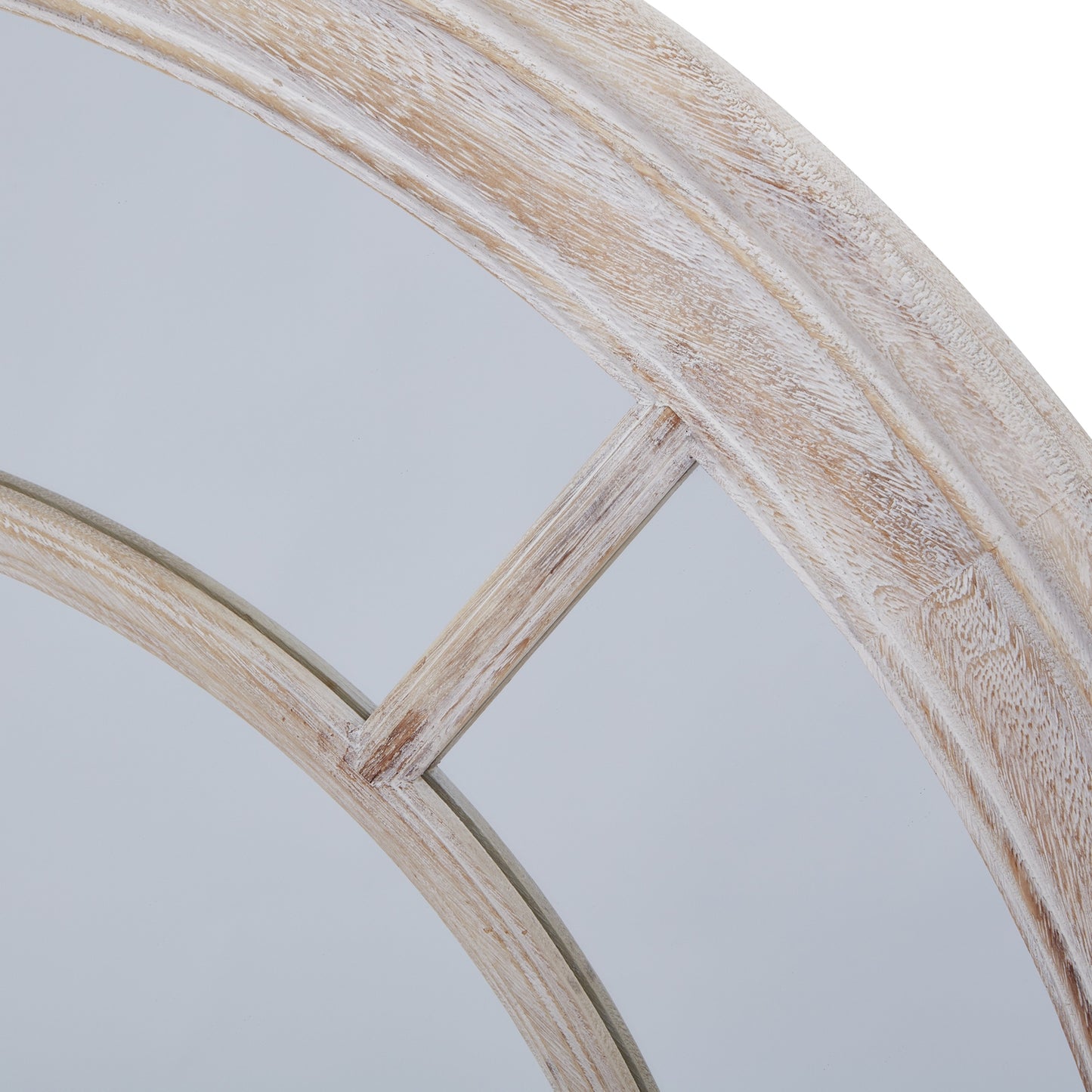 Round mirror with a weathered wood frame in soft, light tones, showcasing a rustic, elegant design and artisanal finishes.