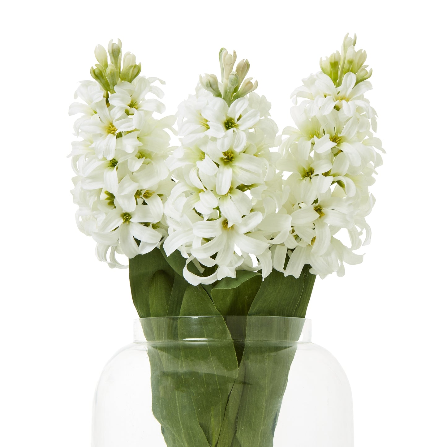 Artificial white hyacinth stem with delicate blooms and lush green leaves, displayed in a clear vase for elegant decor.
