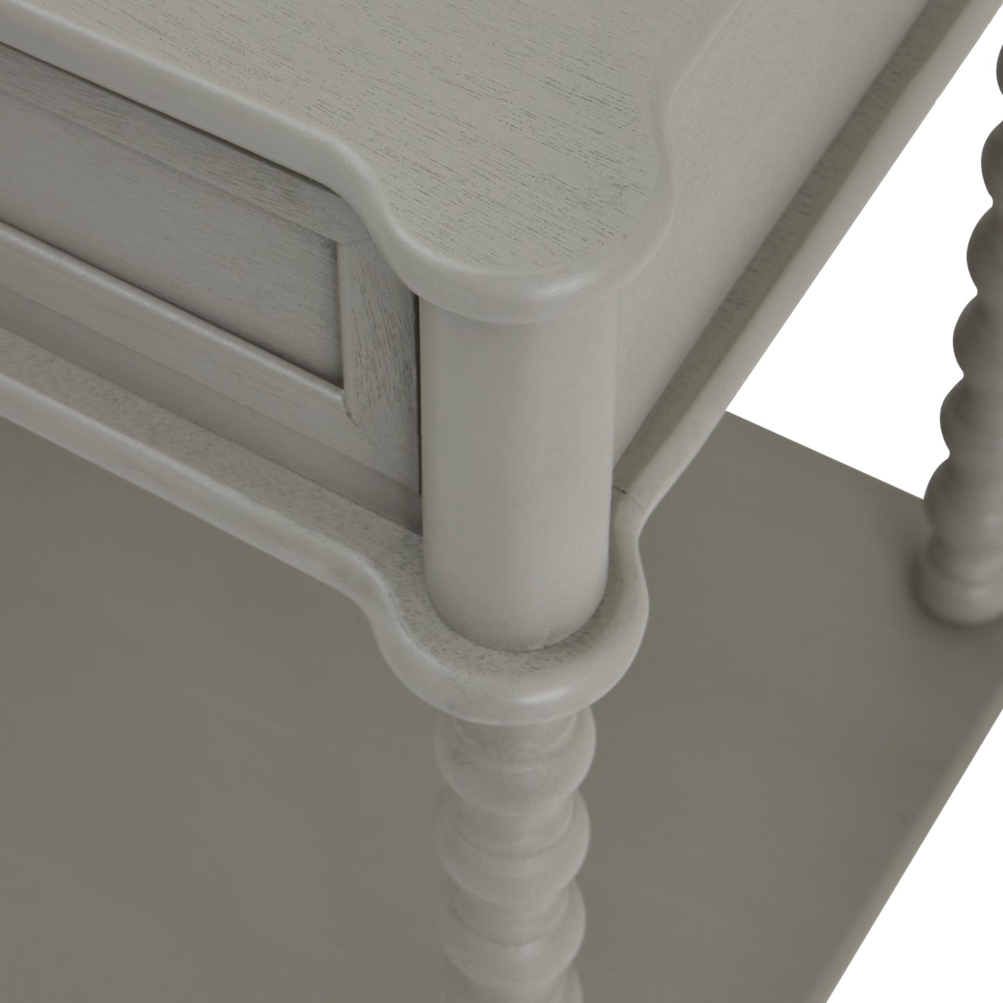 Large, light gray console table featuring curved edges and two spacious drawers, emphasizing elegant craftsmanship and modern design.