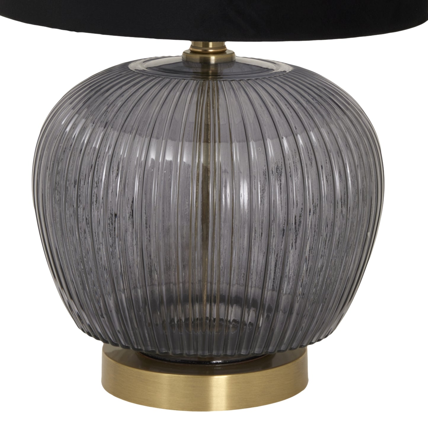 Ribbed glass lamp base with a gold accent, topped by a luxurious black velvet shade, ideal for elegant decor.