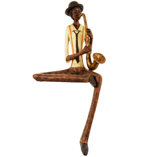 Sitting jazz figurine with brown and gold accents, elegantly crafted, playing saxophone, exuding charm and sophistication.