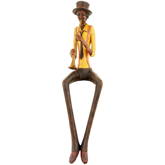 Sitting jazz band trumpeter figurine with intricate details, dressed in vintage-style yellow shirt and black hat, exuding musical charm.