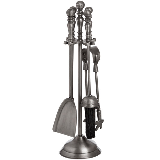 Antique pewter companion set with detailed handles, featuring essential fireplace tools on a sturdy stand, exuding sophistication.
