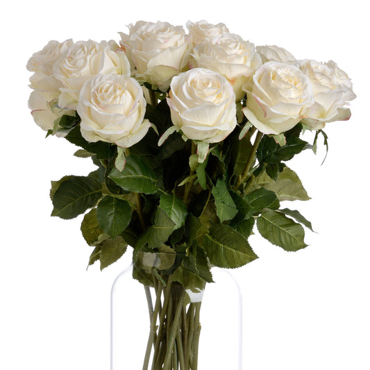 Elegant arrangement of artificial white roses with realistic petals and lush green leaves, perfect for timeless home decor.