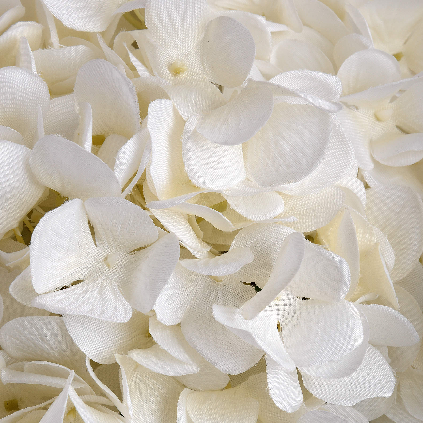 Lifelike oversized white hydrangea petals, creating a soft and elegant enhancement for any decor. Perfect for vases or arrangements.