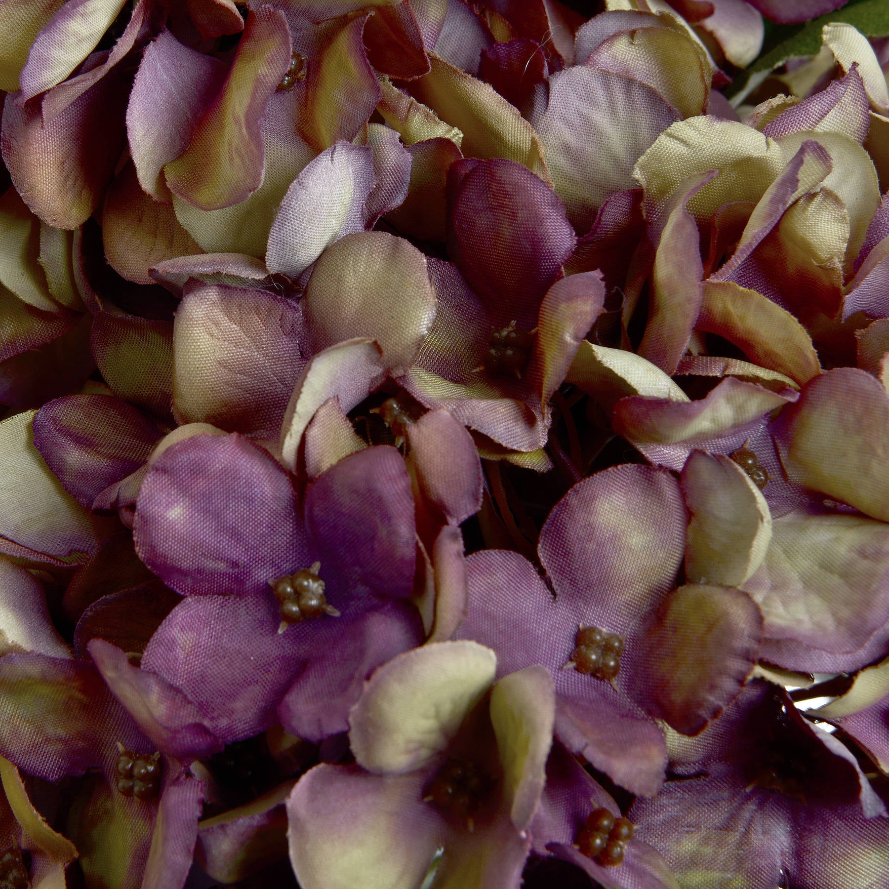 Rich burgundy and purple petals blend seamlessly, evoking autumn elegance in this high-quality, artificial hydrangea stem.