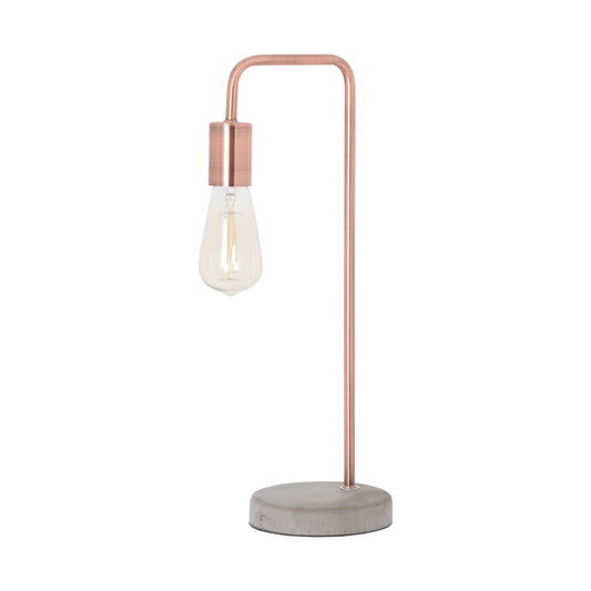 Copper industrial lamp featuring a teardrop bulb, set on a sleek stone base; elegant and modern design.