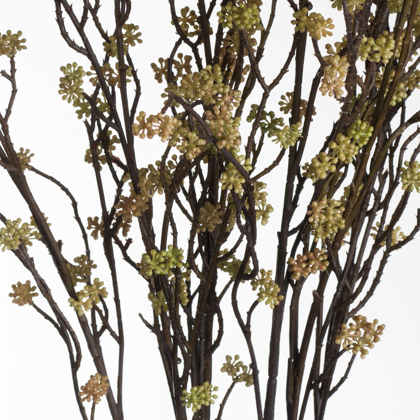 Realistic artificial branch with green and muted yellow flowers on dark brown stems, perfect for elegant decor and arrangements.