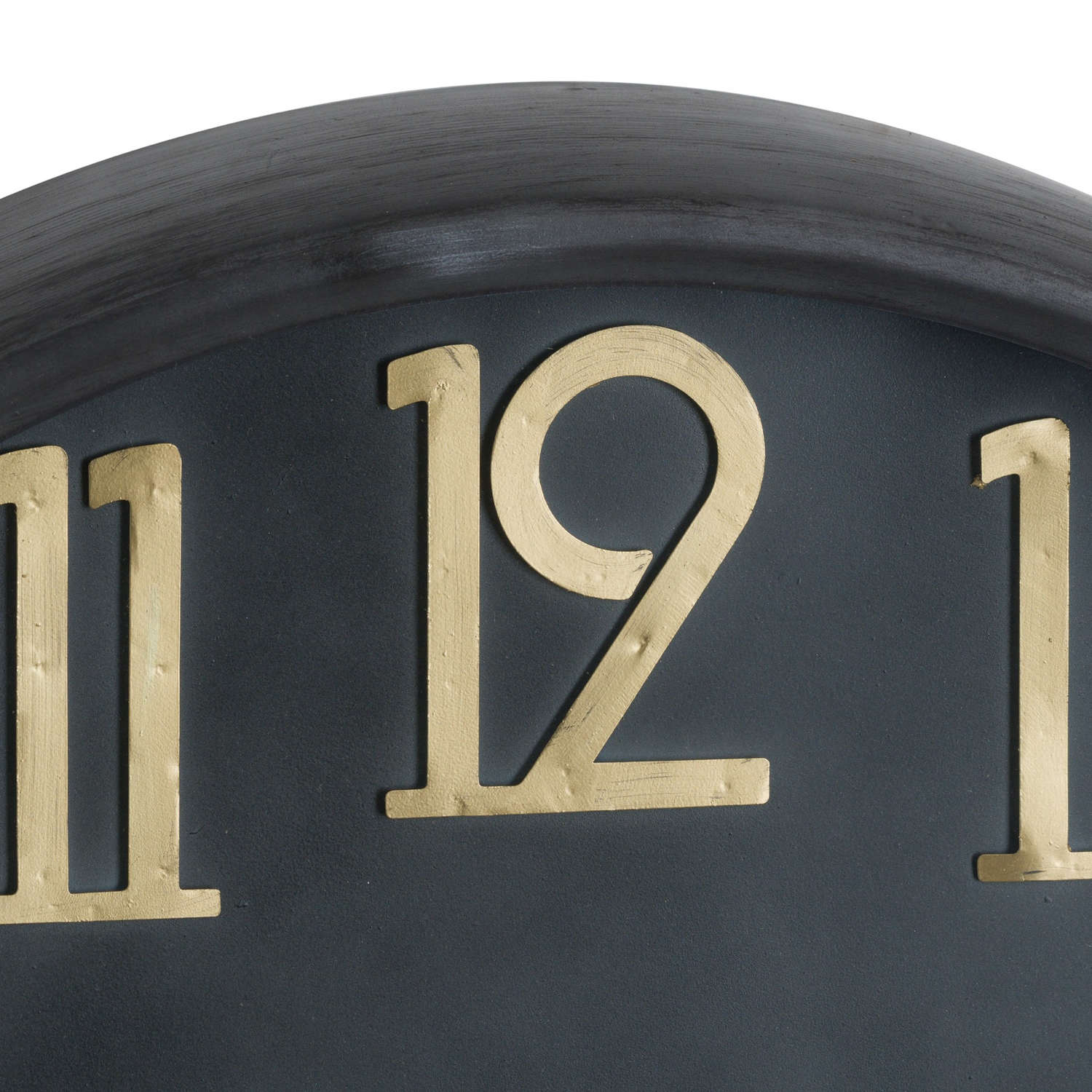 Large black wall clock with brass numerals, featuring a vintage-modern design that enhances elegant interiors.