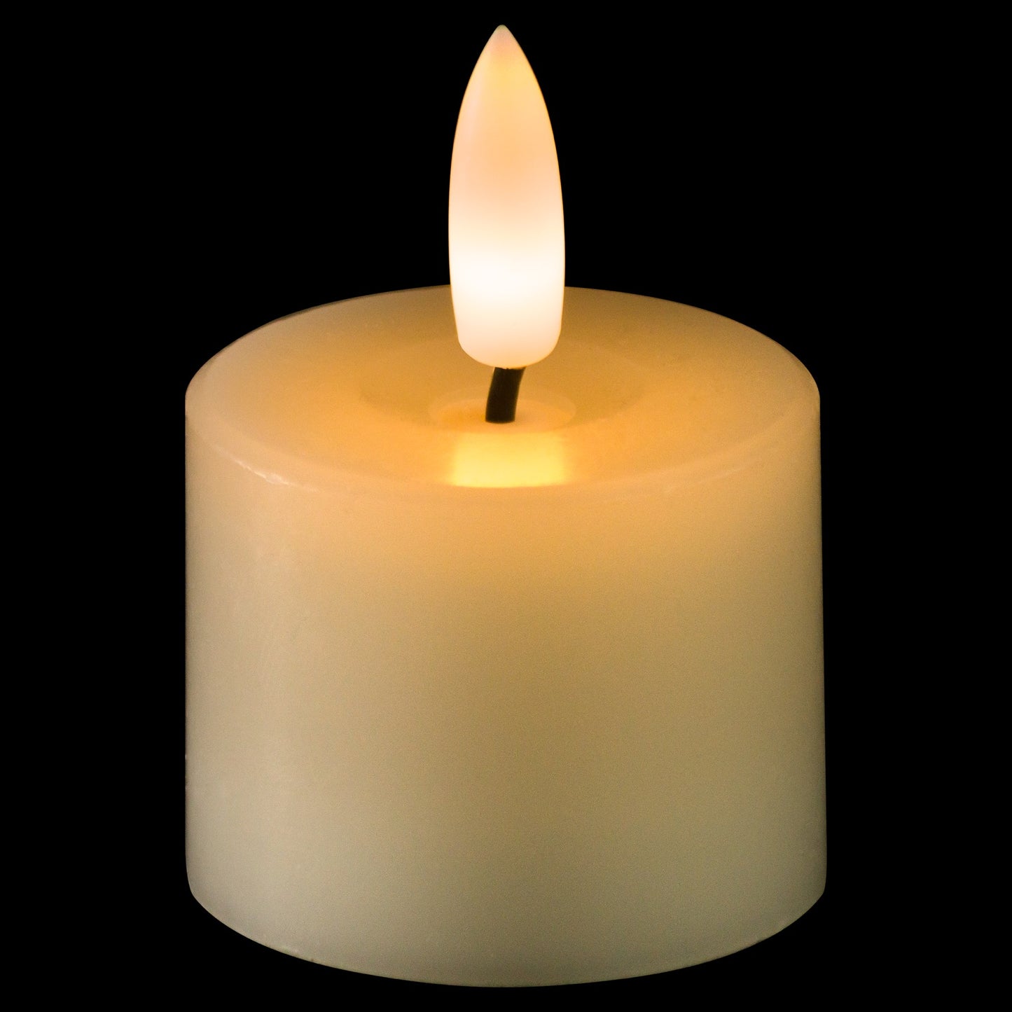 White LED tealight candle with realistic flame effect and soft amber glow, creating an elegant and cozy atmosphere.