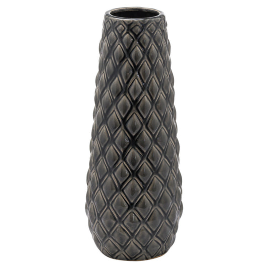 Textured red vase featuring modern geometric patterns, designed to enhance sophisticated interiors with timeless elegance.