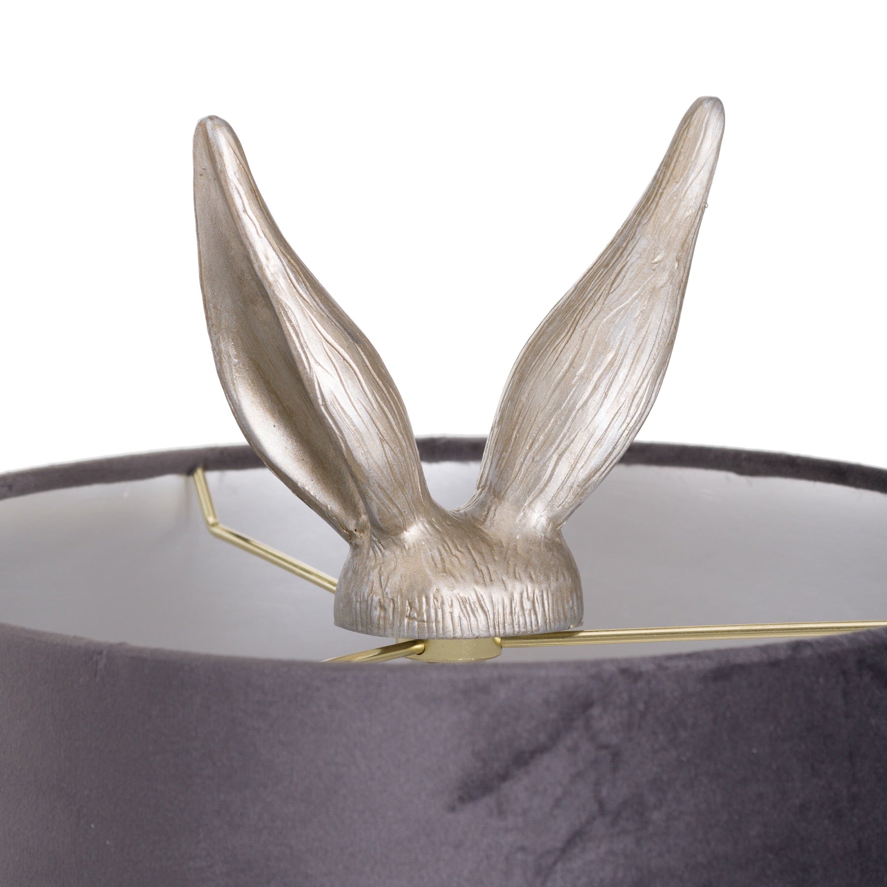 Silver hare table lamp with elegant grey velvet shade; whimsical design adds charm and warmth to any space.