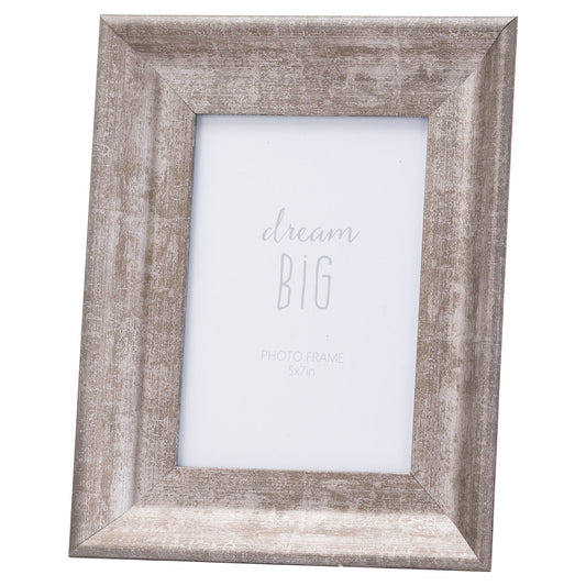 Convex silver 5x7 photo frame with a distressed finish, showcasing an elegant and versatile design for various decor styles.