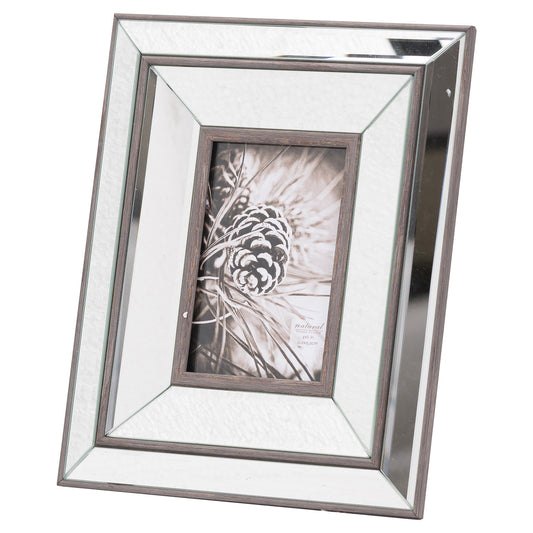 A red wood photo frame featuring a beveled mirror design, combining rustic charm with modern elegance for stylish décor.