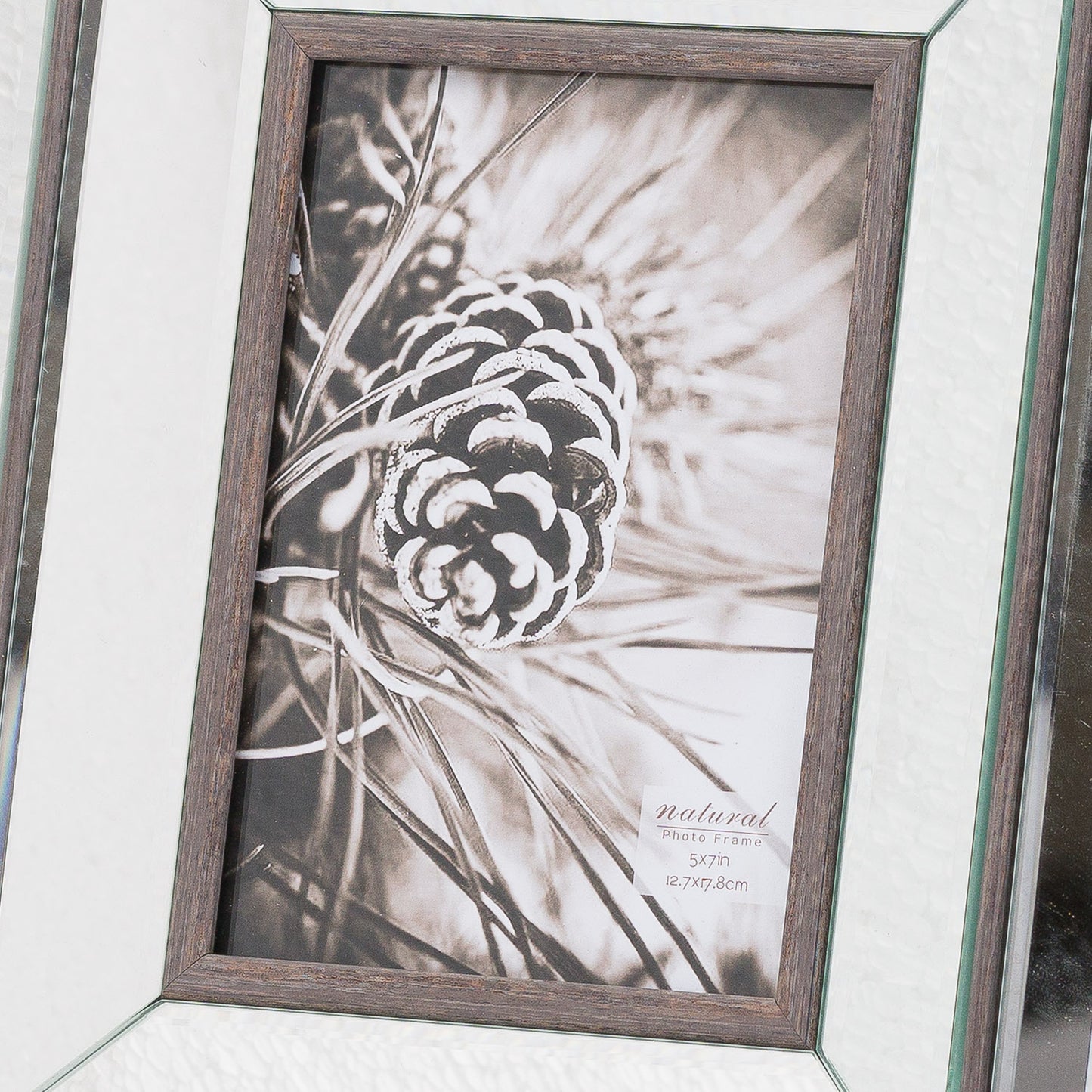 Elegant 5x7 frame combining a beveled mirror with warm wood tones, featuring a chic design for showcasing cherished memories.