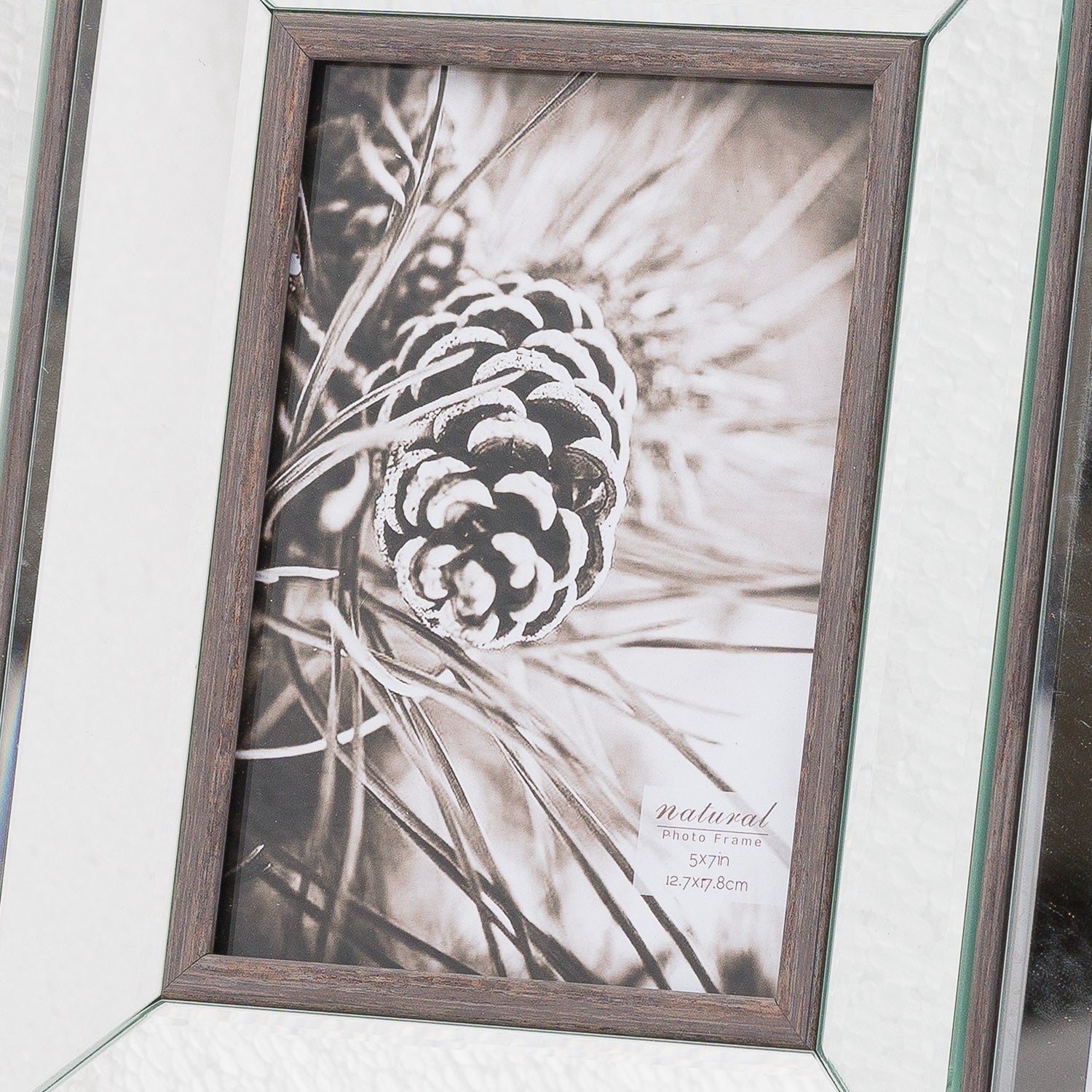 Elegant 5x7 frame combining a beveled mirror with warm wood tones, featuring a chic design for showcasing cherished memories.