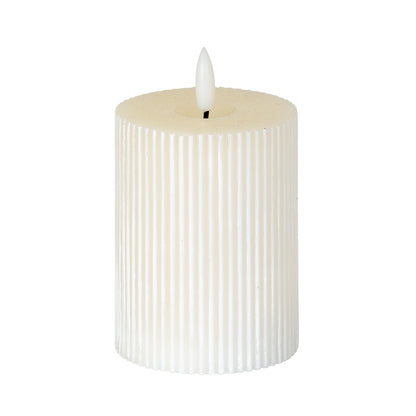 Luxe Collection Natural Glow 3x4 Textured Ribbed LED Candle - Candles from the Quanta Home collection.