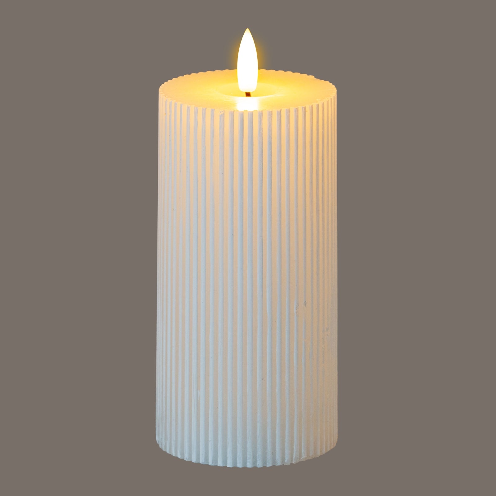 Luxe Collection Natural Glow 3x6 Textured Ribbed LED Candle - Candles from the Quanta Home collection.