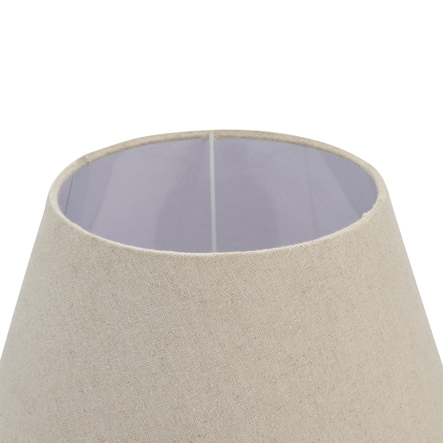 Neutral linen shade atop a grey-washed wood base, creating a warm, inviting glow for elegant interiors.