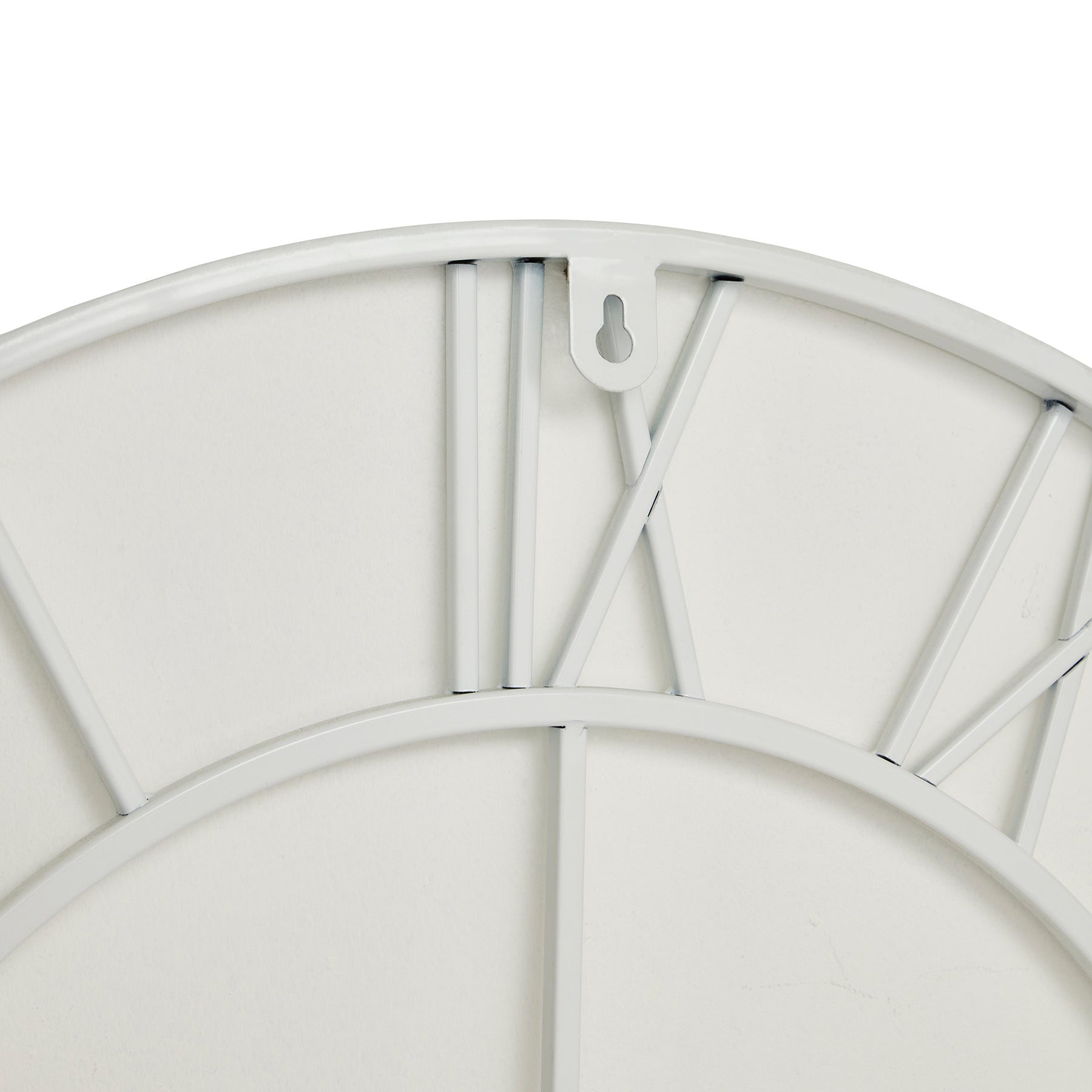 Sleek white skeleton wall clock featuring minimalist design and quality craftsmanship, ideal for modern and classic interiors.