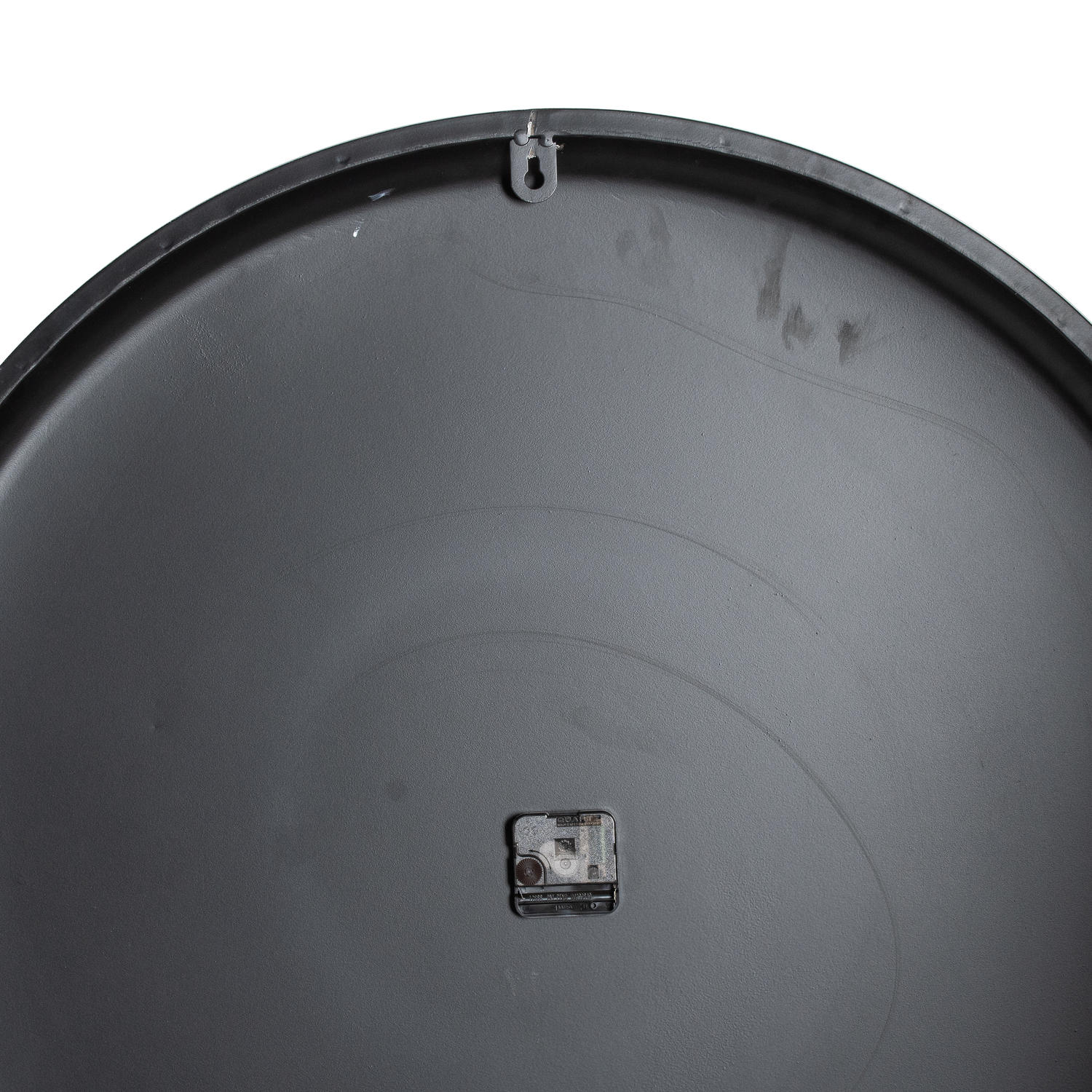 Sleek black wall clock with an 80 cm diameter, featuring minimalistic design and refined metalwork for modern interiors.
