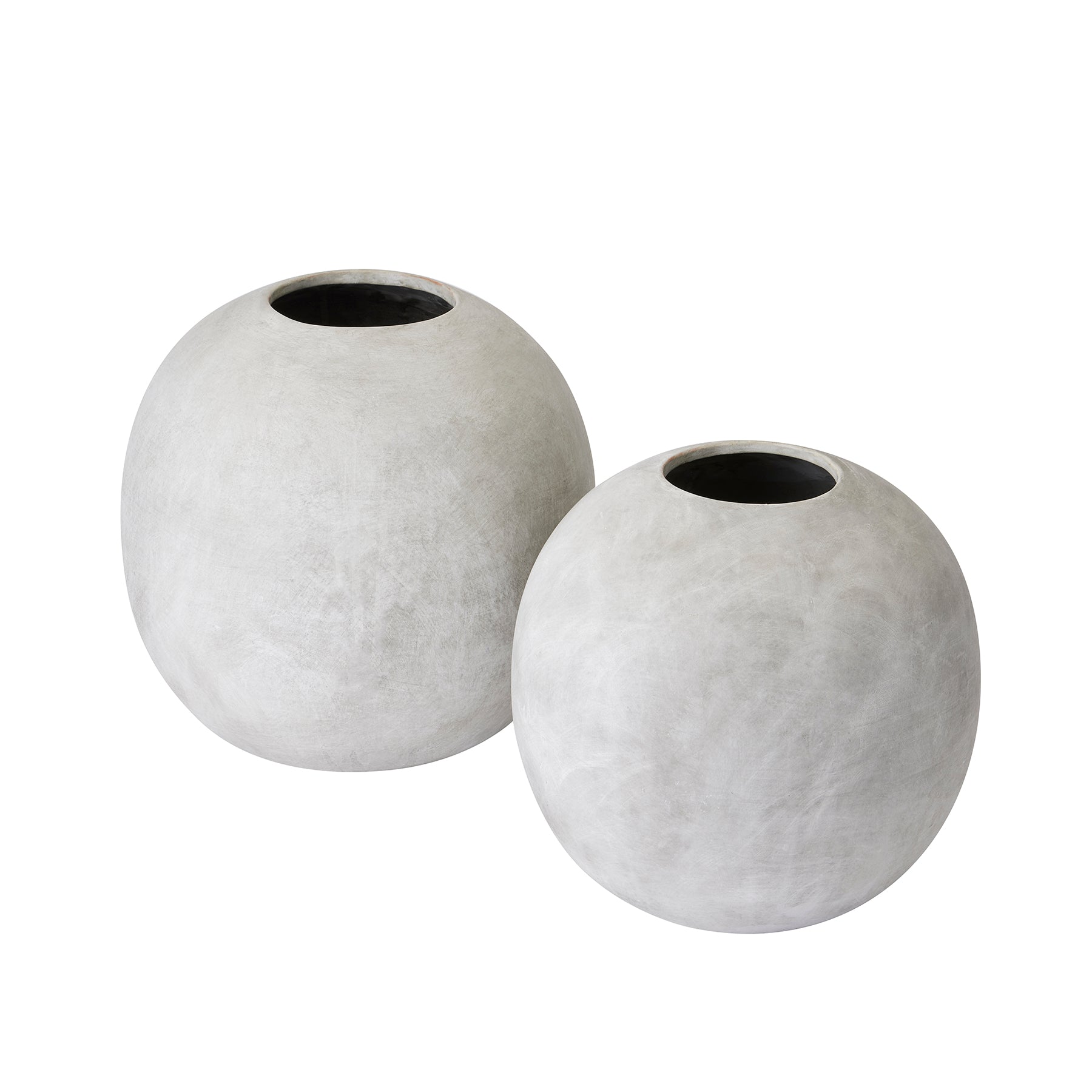 Sleek, contemporary globe vases in soft gray with a polished finish, perfect for faux flower arrangements and elegant decor.