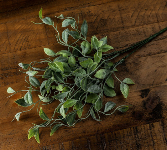 Lifelike green foliage bunch with varied shades, featuring realistic leaves and natural movement, perfect for any decor style.