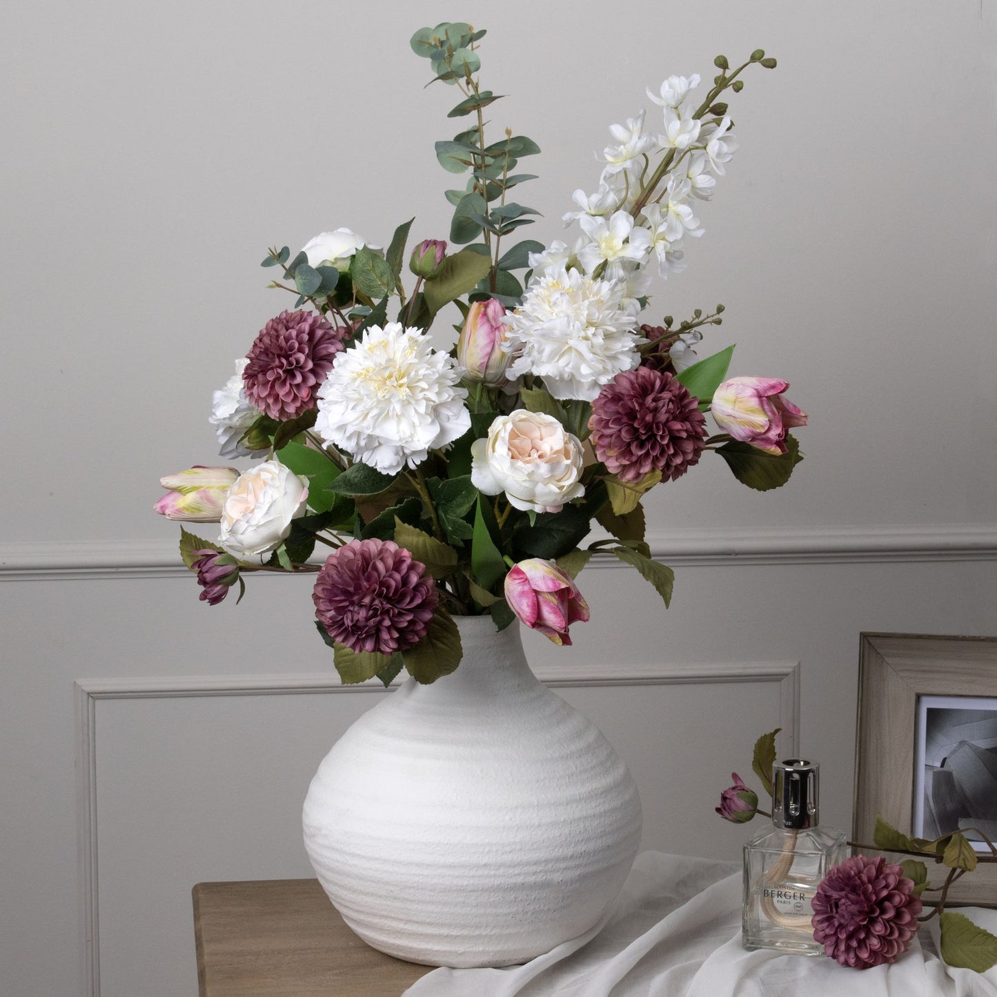Elegant tall white delphinium stem with intricate, lifelike florets, perfect for enhancing modern or classic decor settings.