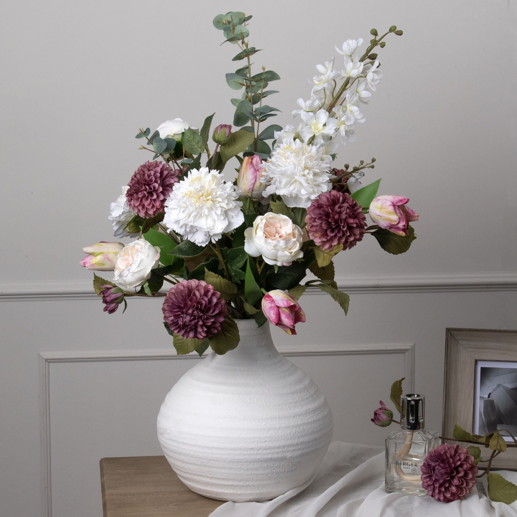 Elegant tall white delphinium stem with intricate, lifelike florets, perfect for enhancing modern or classic decor settings.